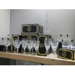 A quantity of boxed Edinburgh crystal whiskey tumblers (4 x 2) and wine glasses (5 x 2) (some boxes