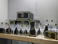 A quantity of boxed Edinburgh crystal whiskey tumblers (4 x 2) and wine glasses (5 x 2) (some boxes