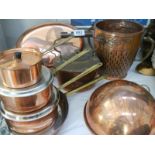 A nice lot of copper items including saucepans,