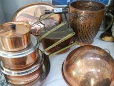 A nice lot of copper items including saucepans,