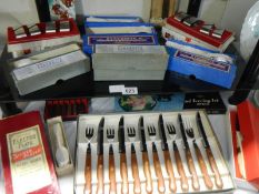 A good lot of unused boxed vintage cutlery