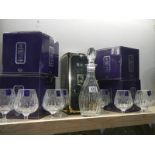 A quantity of boxed Edinburgh crystal brandy glasses (4 x 2) and a decanter