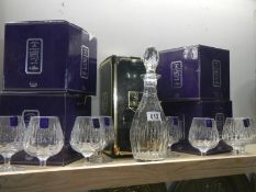 A quantity of boxed Edinburgh crystal brandy glasses (4 x 2) and a decanter