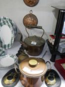 A quantity of brass and copper including a kettle and jelly moulds