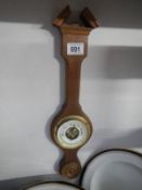 A small mahogany barometer