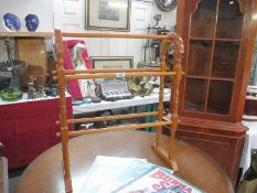 A wooden clothes rail