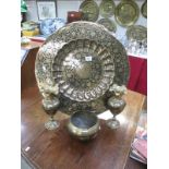 A large brass patterned tray and 3 other brass items