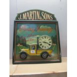 A vintage style wooden advertising sign wall clock