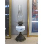 A Victorian Wright & Butler oil lamp with brass base