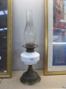 A Victorian Wright & Butler oil lamp with brass base