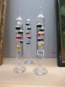 3 glass thermometers