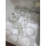 A good lot pf glassware including decanters, cake stands etc.