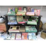 4 shelves of boxed and unboxed vintage soap / talcum powder etc.