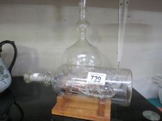 2 filigree glass ships in bottles