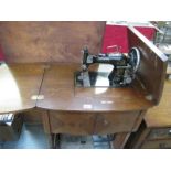 A Vesta treadle sewing machine (SERIAL NO 1441 544) in cabinet (no drive belt,