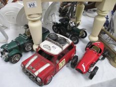 4 display models of cars