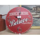 A vintage 'Believe' clock