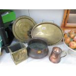 A brass tray, wall plate, hammered copper bowl, lidded copper jug etc.