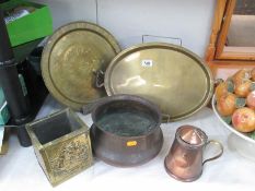 A brass tray, wall plate, hammered copper bowl, lidded copper jug etc.