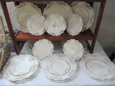 18 pieces of Leedsware including 8 large plates and 10 small plates