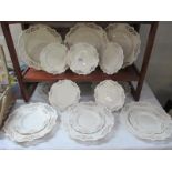 18 pieces of Leedsware including 8 large plates and 10 small plates