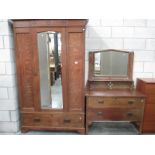 A large mirror fronted oak wardrobe and a 2 drawer dressing table