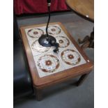 A continental tile top teak coffee table