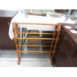 A wooden towel rail