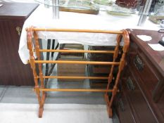A wooden towel rail