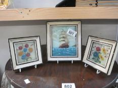 A 1956 3D painting on glass of sailing ships and 2 of flowers