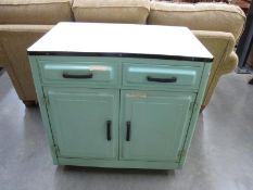 A good 1950s green enamel kitchen unit with white top
