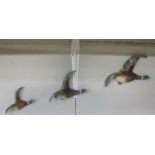 3 wall mounted flying ducks marked H O England on back ****Condition report**** Some