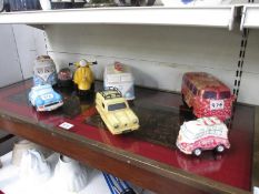 A quantity of money boxes etc including V W Camper Vans etc