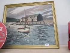 A framed oil painting of a coastal fishing boat scene by D J Reynolds