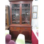 A Victorian mahogany astragal topped bookcase