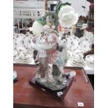 A large Juliana collection figural lamp with horse and courting couple