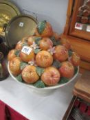 A large Spanish orange fruit display on stand