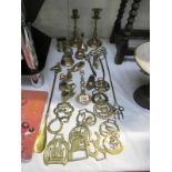 A quantity of brass items including candlestick and horse brasses