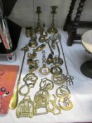 A quantity of brass items including candlestick and horse brasses