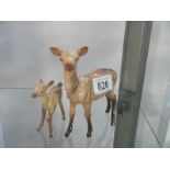 A Beswick deer and fawn