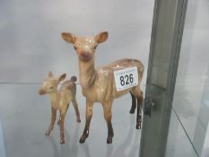 A Beswick deer and fawn