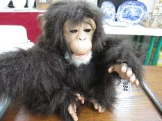 A clapping monkey toy (requires batteries)