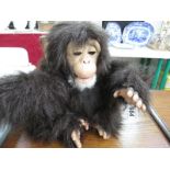 A clapping monkey toy (requires batteries)