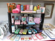 4 shelves of vintage soaps and talcs etc