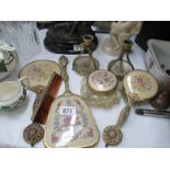 A vintage tapestry backed dressing table set including candlesticks