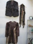 A collection of 4 furs including coat,