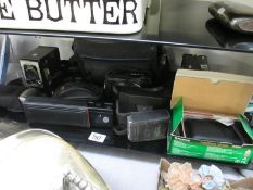 A quantity of vintage cameras and accessories