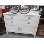 A 2 drawer 2 door white painted cupboard