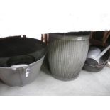 A vintage steel bath tub, 2 large handled pans, griddle,