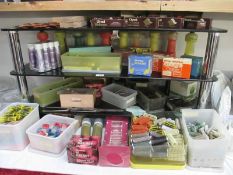 A lot of vintage hairdresser items including rollers, lotion, pins, curling irons etc.